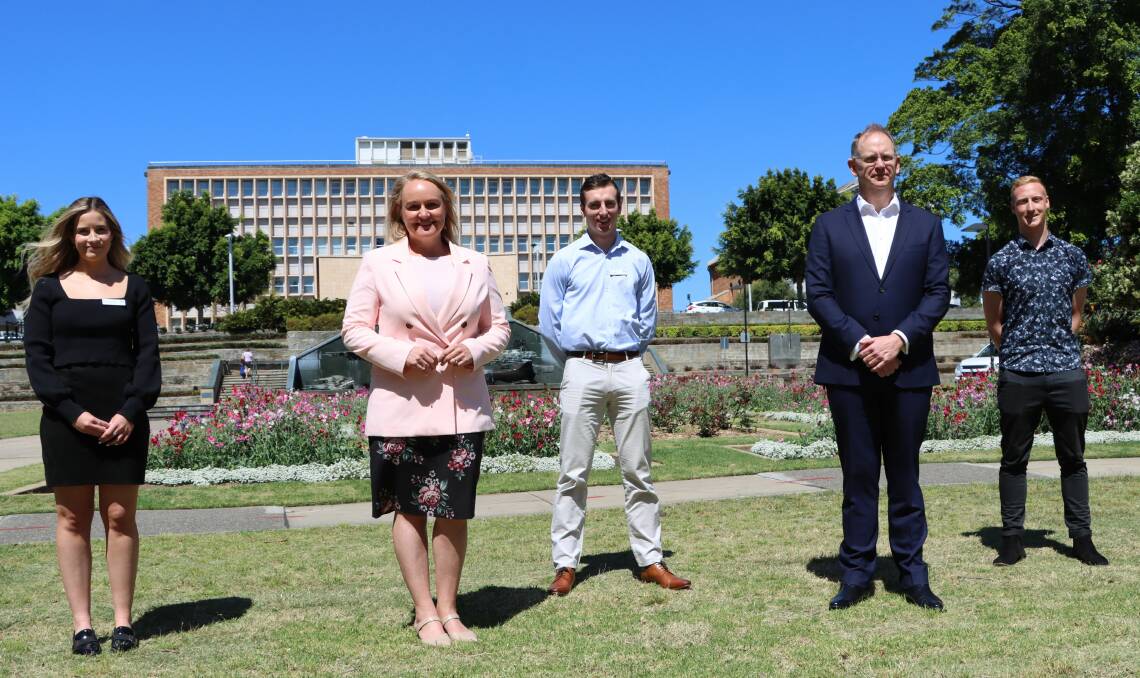CHARTER: From left, Rachael McMurray undergraduate engineering officer at City of Newcastle, Cr Nelmes, Craig Carmody CEO Port of Newcastle, Nicholas Morgan trainee civil project designer at City of Newcastle and Ryan McNab IT trainee at Port of Newcastle.
