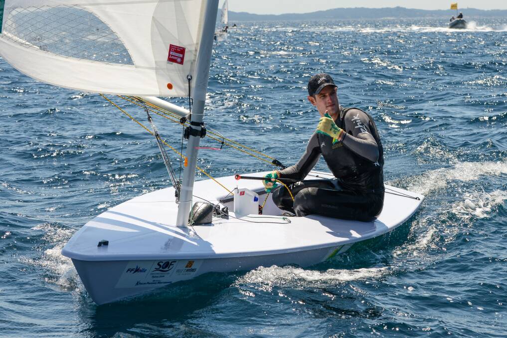 HOME GROWN HERO: Australian sailor Matthew Wearn takes the gold medal in the regatta at Hyères.