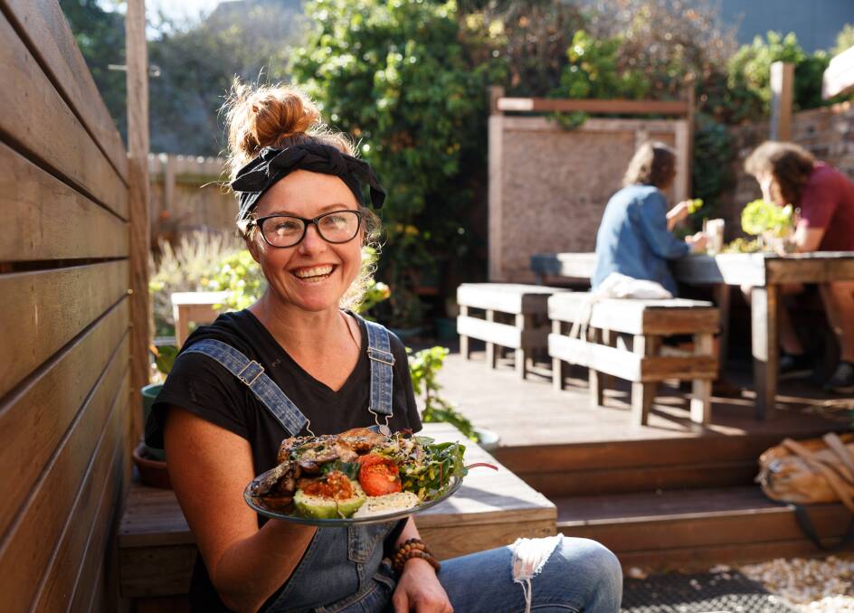 HERE COMES THE SUN: Pickled and Pressed head chef Rebecca Roper with the Big Breakfast. Pictures: Max Mason-Hubers