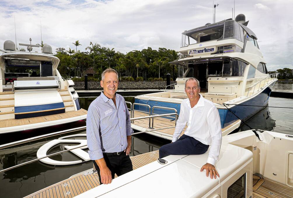 BIGGER IS BETTER: Johan Hasser General Manager, Sanctuary Cove International Boat Show (left) with Riviera owner Rodney Longhurst.