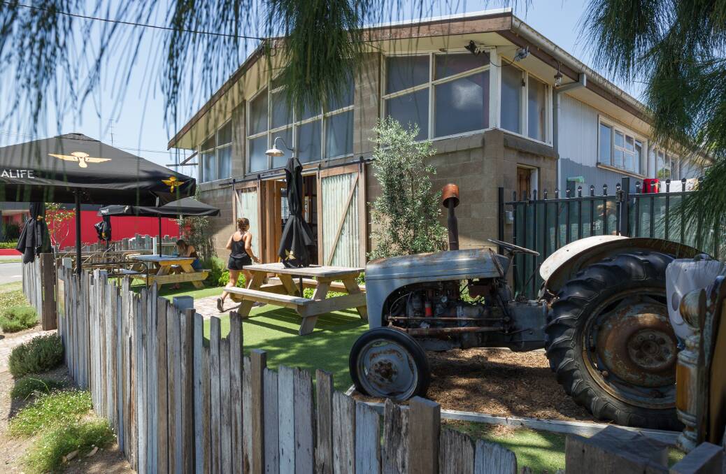 THE BARN: There's plenty of parking, even for the tractor, at this rustic eatery in Adamstown. Pictures: MAX MASON-HUBERS