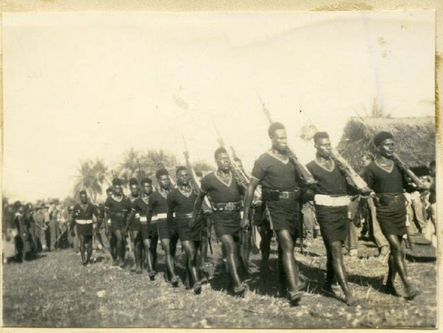 HONOURED: The Papuan native infantry battalion on the march.
Image: University of Newcastle's Cultural Collections