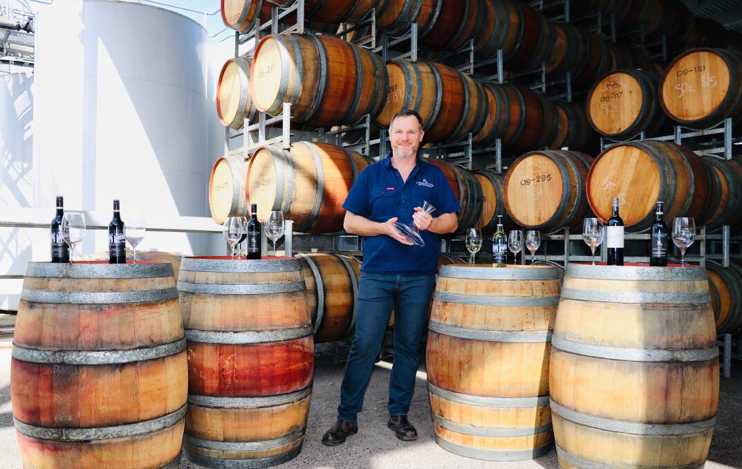 HIGHLANDS WIN: Senior winemaker Aaron Mercer with a some of the nine award-winning Tamburlaine wines.