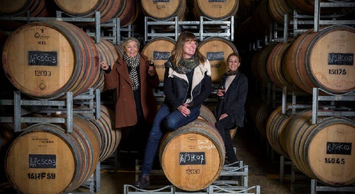 FINE REPUTATION: The Tolley sisters, Ang (left) and Bec (right) with the Penley Estate winemaker Kate Goodman.
