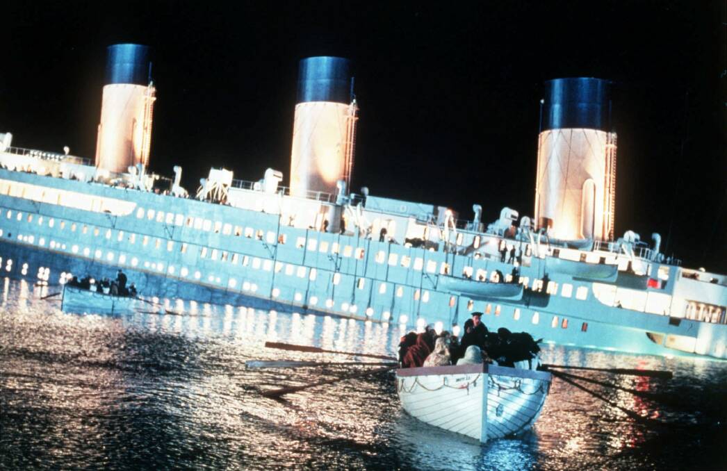 Real-life tragedy: The giant liner sinks in a film still from James Cameron's 1997 blockbuster Titanic.