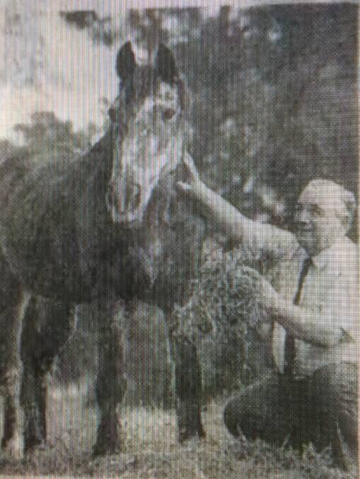 HORSE SENSE: Murphy with John Carter at Wallsend RSPCA in 1992.