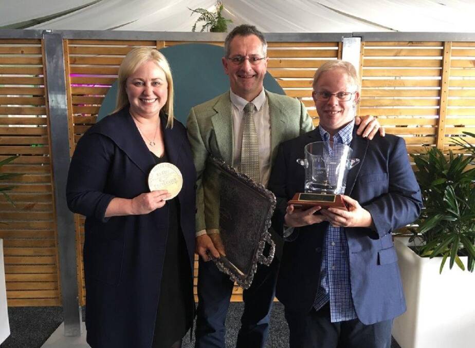 GOOD SHOW: Jane Tyrrell, chief winemaker Andrew Spinaze and John Tyrrell with some of Tyrrell's 10-trophy Hunter Valley Wine Show haul. Picture: Tiffany Naysmith
