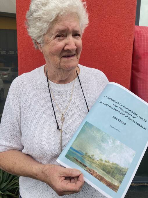 Janis Winn with her new book celebrating the companys 200-year history.