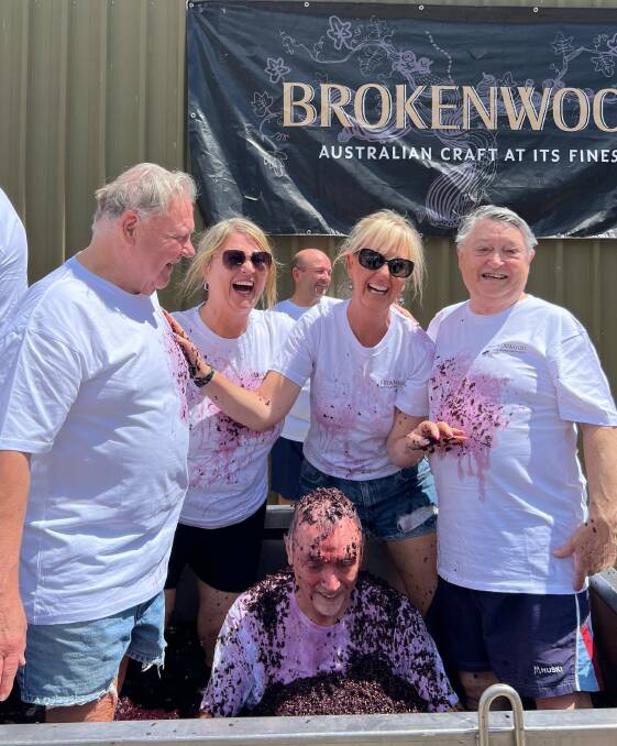 Marking this year's Get Your Hands Dirty Day are Brokenwood Grand Cru members Peter Bell, Lisa Oleson, Annmaree Bell, Cary Thompson and John Frank.