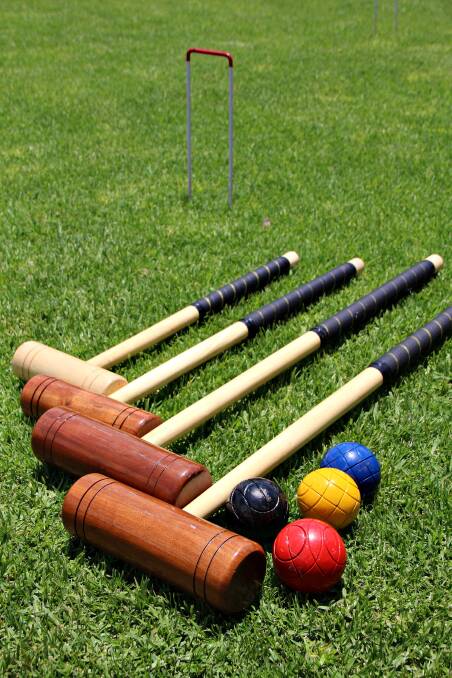 HAVE A GO: Golf croquet is held on Wednesday at Straight Drive, Toronto. 
