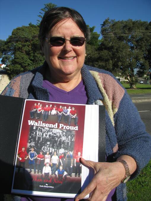 Amazing suburb: Cath Chegwidden with her new book. Picture: Mike Scanlon