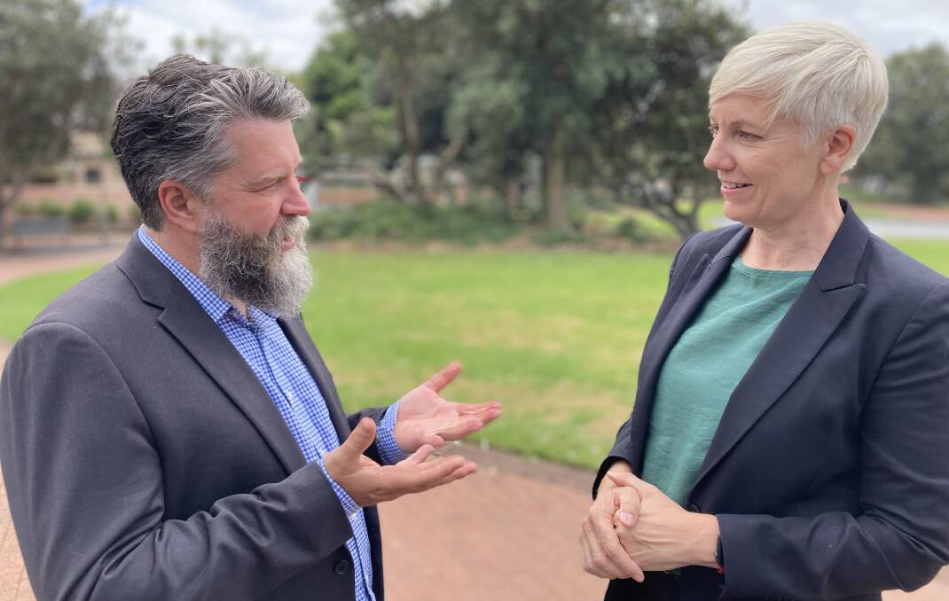 John Mackenzie in Newcastle on Friday with Greens upper house MP Cate Faehrmann. Picture by Michael Parris