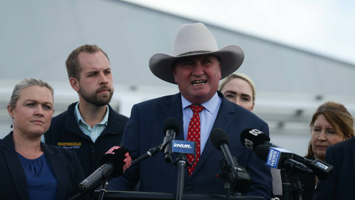 TERMINAL VELOCITY: Barnaby Joyce announces funding for the Newcastle Airport terminal upgrade at Williamtown on Thursday. Picture: Jonathan Carroll 