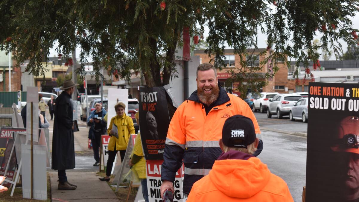 HIGH VISIBILITY: Labor candidate Dan Repacholi at Singleton pre-poll on Friday. Picture: Ethan Hamilton