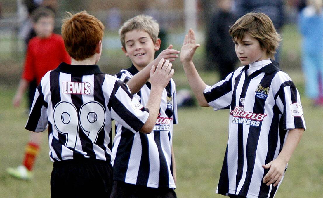 HANDS OFF: Players will be discouraged from celebrating goals together when soccer resumes this weekend.