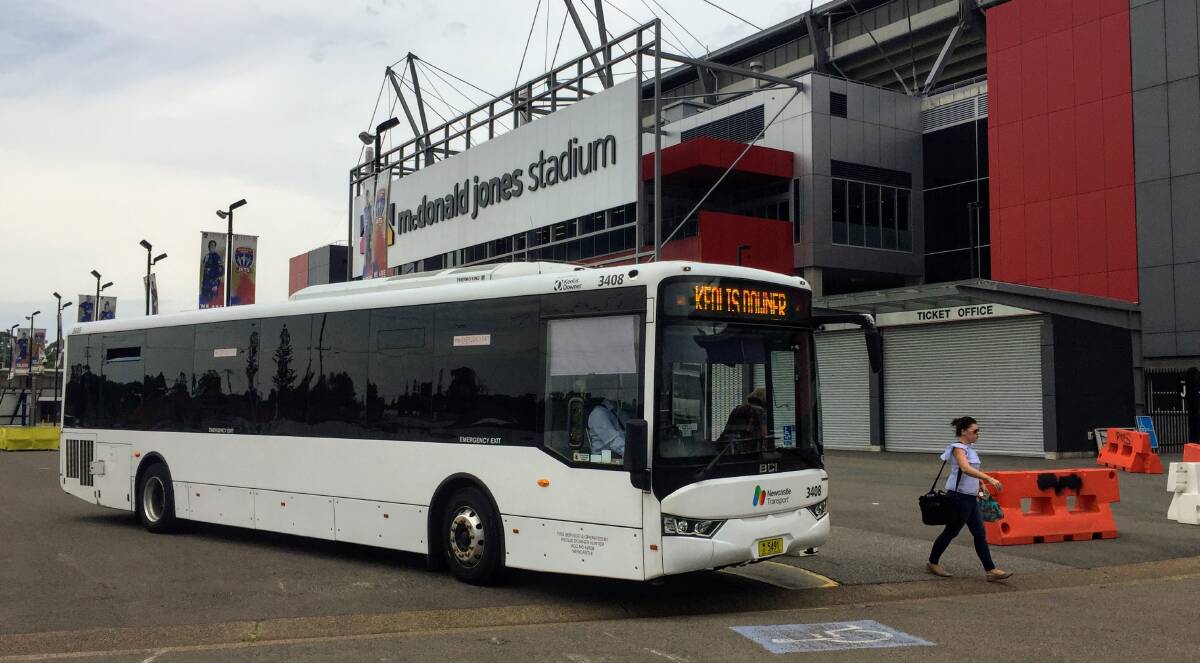 ROLLING ON: A park-and-ride bus pulls up at Hunter Stadium last year. 