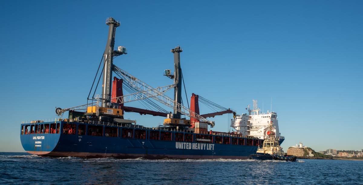 Two mobile freight cranes arrive in Newcastle port on Tuesday.
