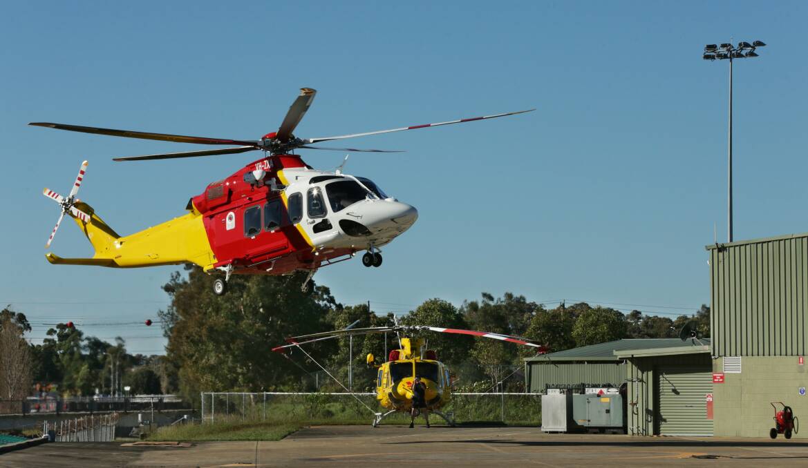 A helicopter taking off at the rescue service's Broadmeadow headquarters.