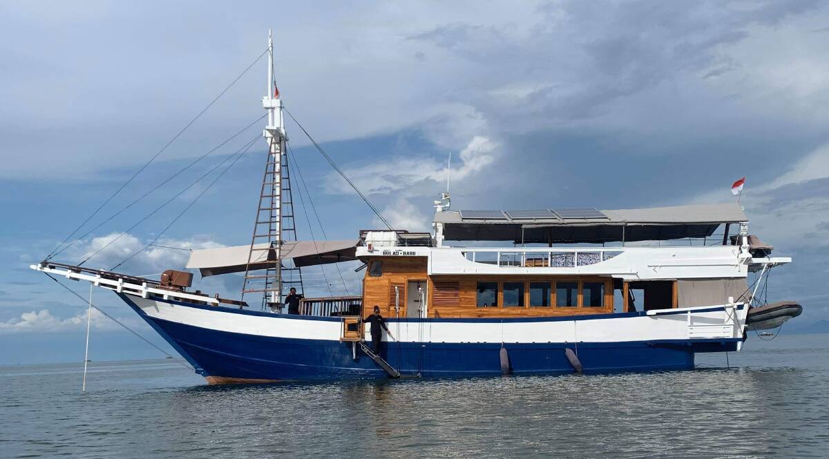 WAITING: The 13 Newcastle surfers are stuck on this charter boat off an island in Indonesia. 