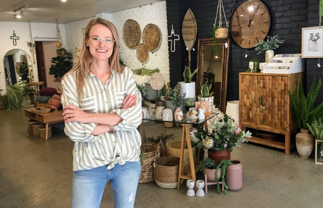 Willow's Home Traders owner Lauren McLellan inside her store on Friday.