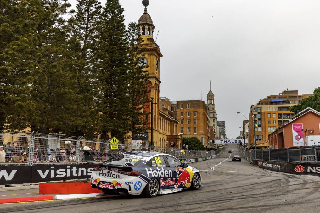 FASTEST: Jamie Whincup on his way to leading practice on day one. Picture: Mark Horburgh 