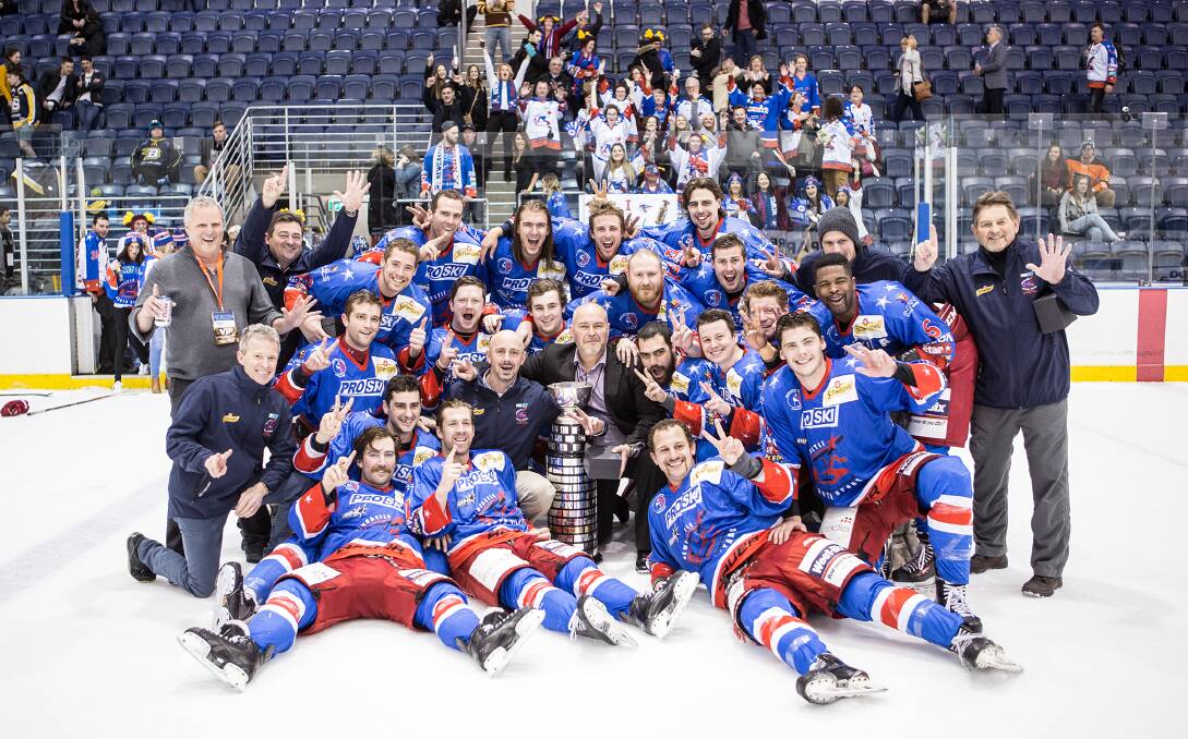 TEAM EFFORT: The North Stars celebrate with the Goodall Cup and their supporters in Melbourne on Sunday. Picture: Mark Bradford