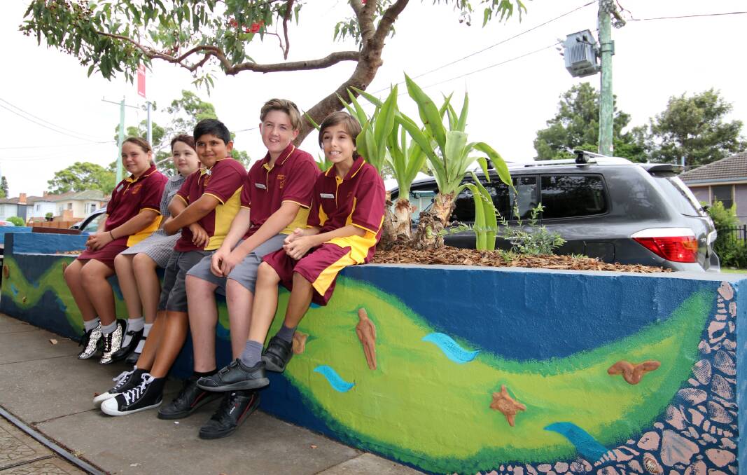 Students from St Pius X Adamstown who contributed to the mural. 