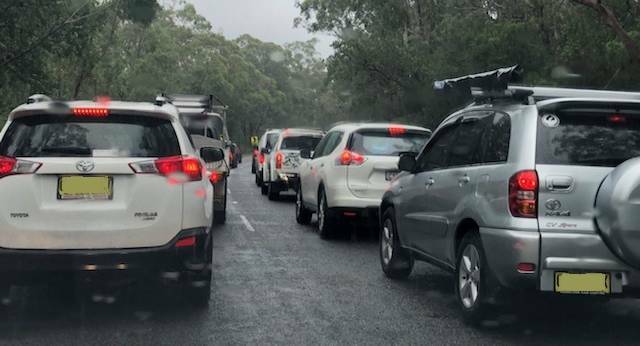 BOTTLENECK: Traffic on Nelson Bay Road at the end of the Queen's birthday weekend last year. The promised works will create another 9km of dual carriageway.