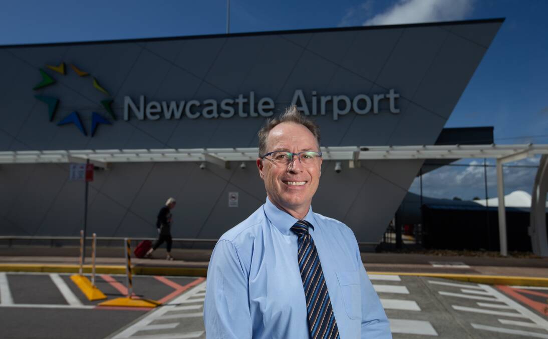 Dr Peter Cock in front of the existing terminal building. Picture: Marina Neil