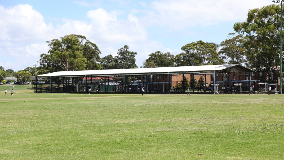 Lambton High students playing on Wallarah Oval on Tuesday. Picture by Peter Lorimer