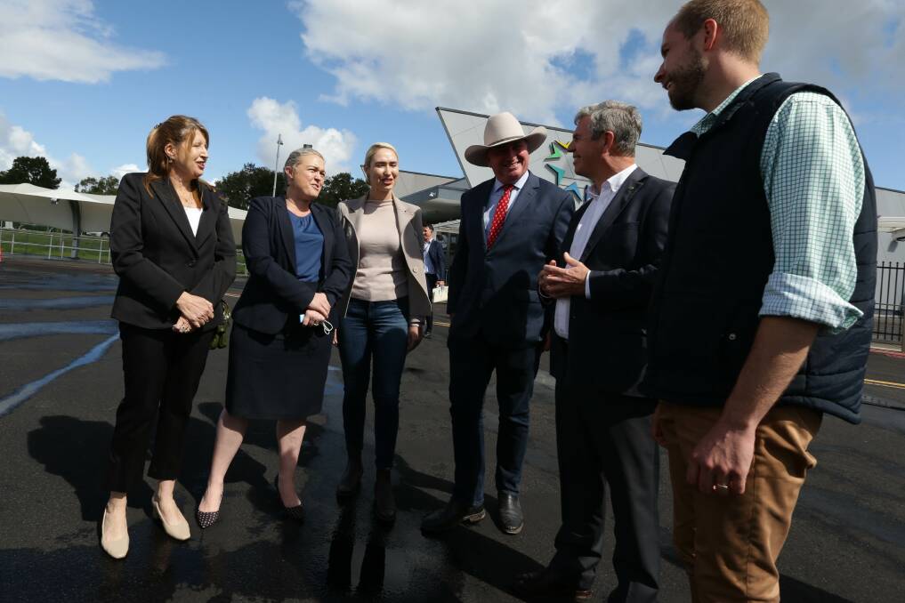 AIRPORT DEAL: Barnaby Joyce with candidates at Williamtown. Picture: Jonathan Carroll