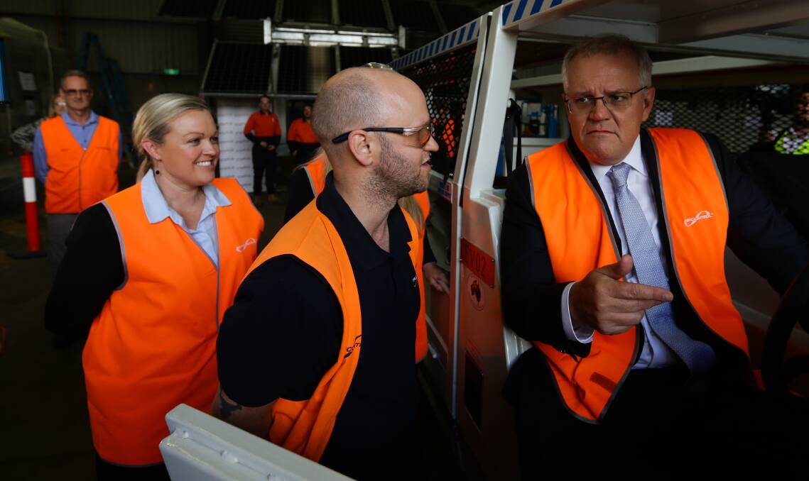 CAMPAIGN TRAIL: Nell McGill with Scott Morrison on Monday. Picture: Jonathan Carroll