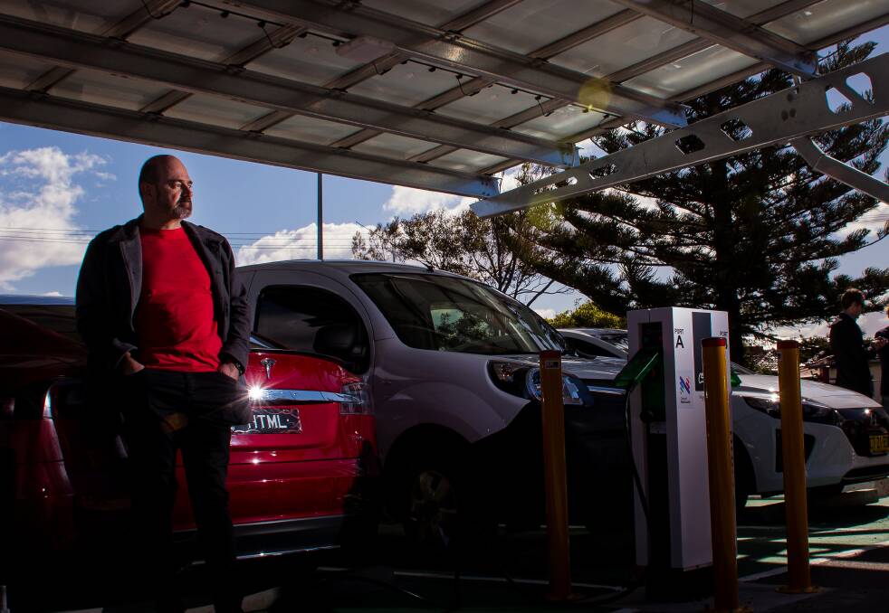 FUEL FOR THOUGHT: Tesla owner Michael Barwell at the solar-powered charging station at No.2 Sportsground on Friday. Picture: Simon McCarthy