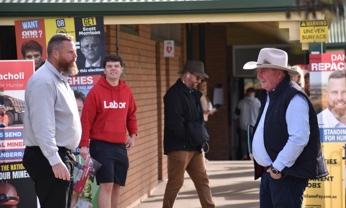 SHOOTOUT: Dan Repacholi and Barnaby Joyce cross paths at Muswellbrook pre-poll on Thursday. Picture: Ethan Hamilton