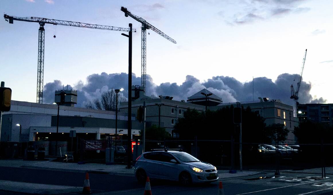 STORM CLOUDS: Developers say Newcastle will weather a downturn in the national housing market. Picture: Michael Parris