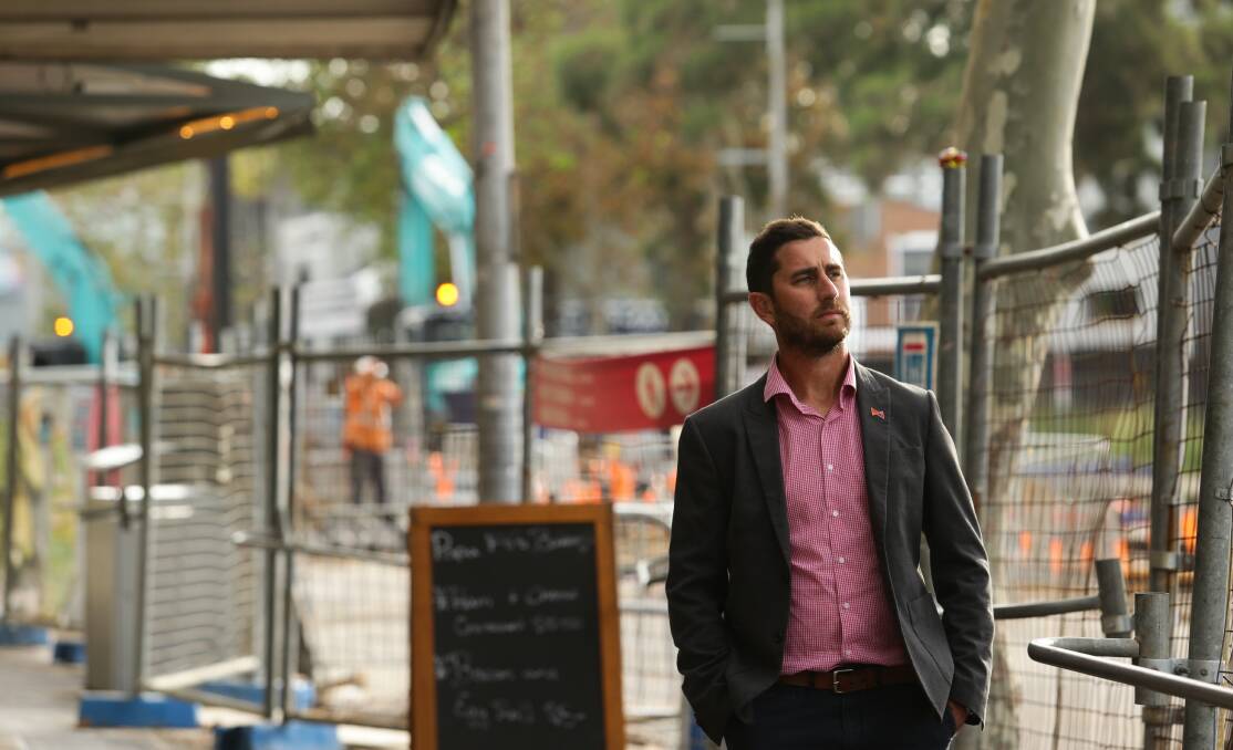 Former Newcastle Now executive manager Michael Neilson in front of light rail works in Hunter Street. Picture: Jonathan Carroll
