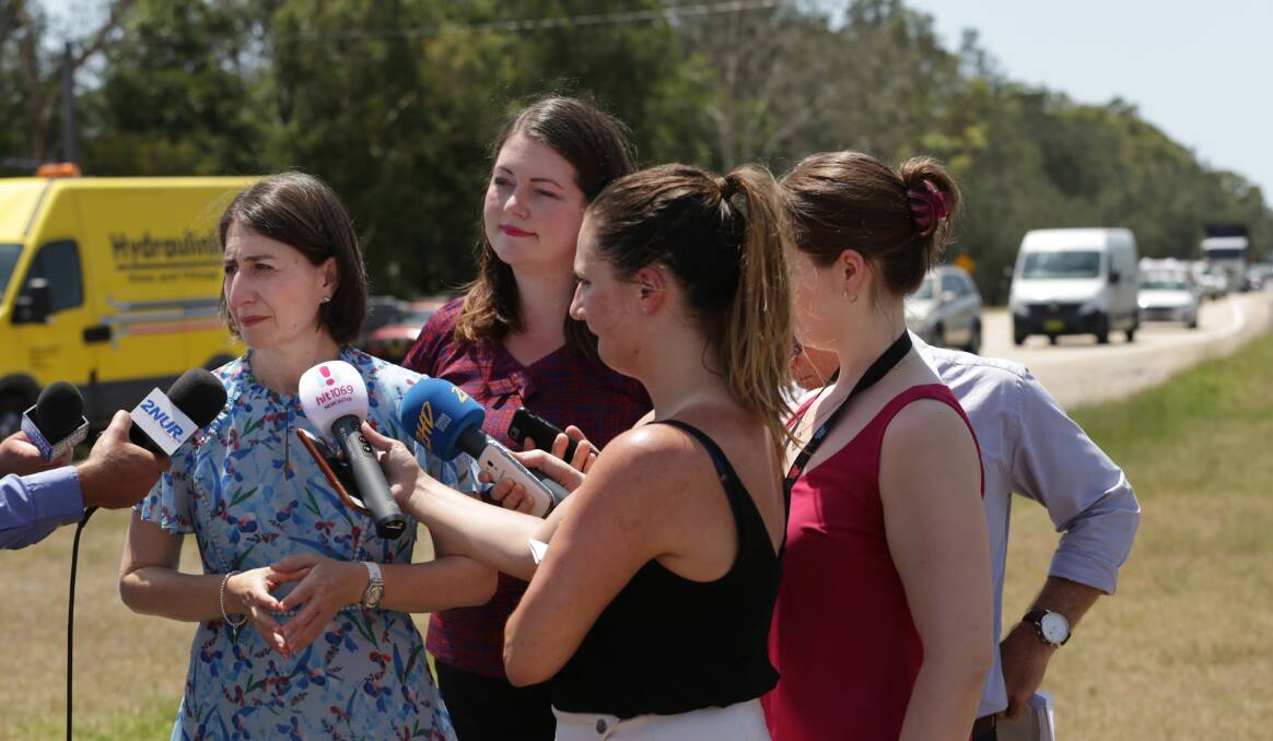 Gladys Berejiklian and Jaimie Abbott announce more funding for Nelson Bay Road during a press conference at Salt Ash on Tuesday. Picture: Simone De Peak