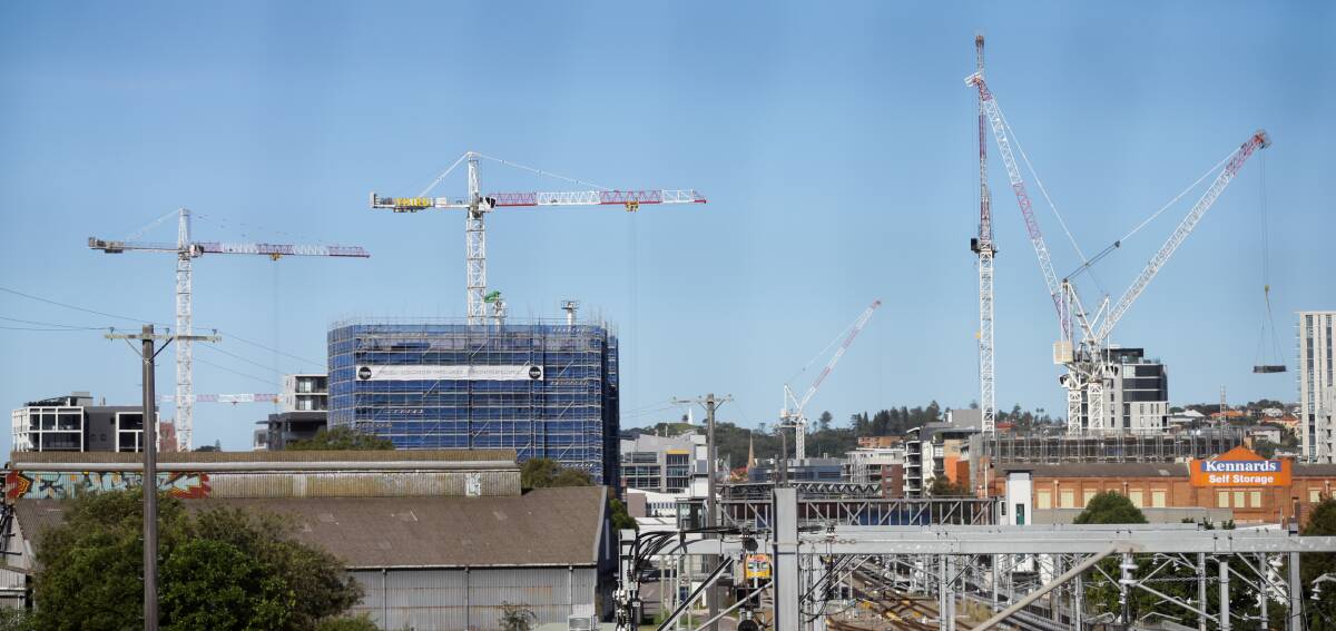 ON THE UP: Seven cranes rise over building sites in Newcastle West. Picture: Jonathan Carroll