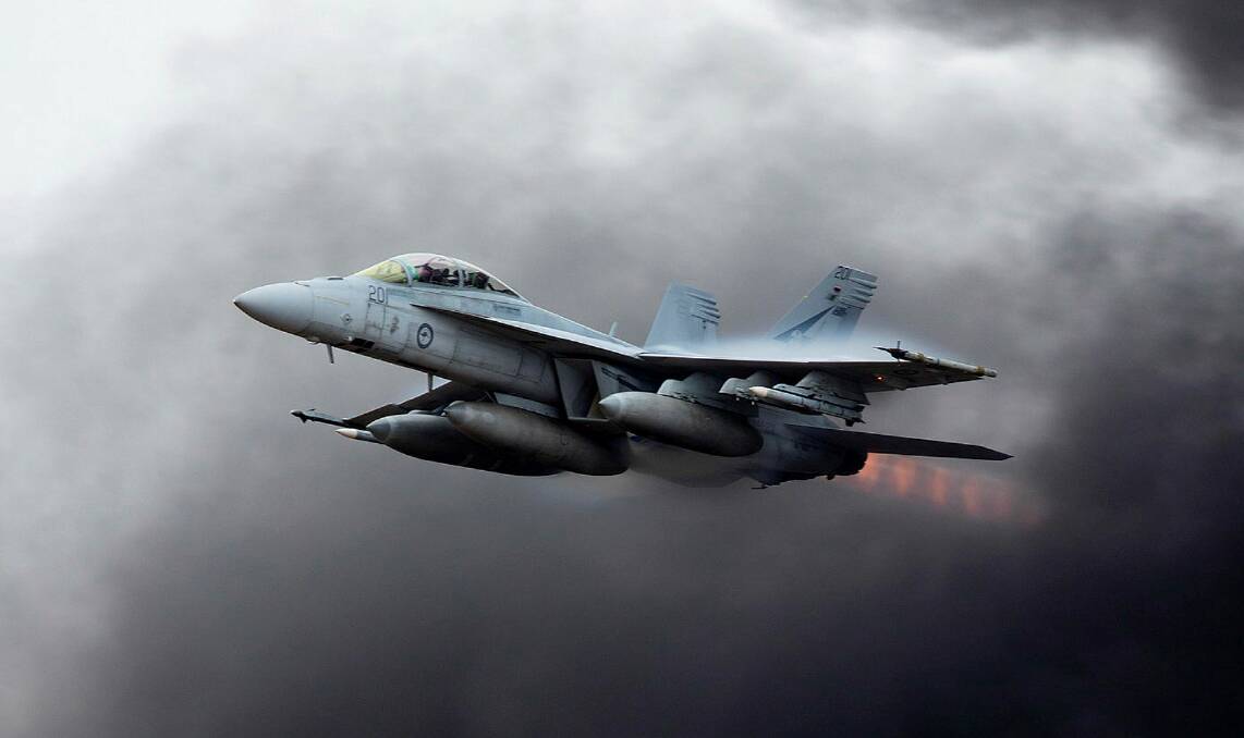 A RAAF F/A-18 Super Hornet during an air display at the Avalon air show in Victoria this year. Picture Department of Defence