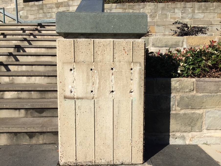 GONE: The Captain Cook plaque to the west of the Civic Park fountain was missing on Monday morning.