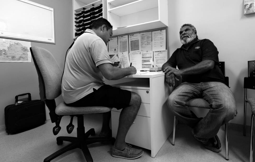 SPEAKING OUT: Newcastle ear, nose and throat surgeon Kelvin Kong, left, while on a visit to Broome Hospital in 2015. Picture: Simone De Peak