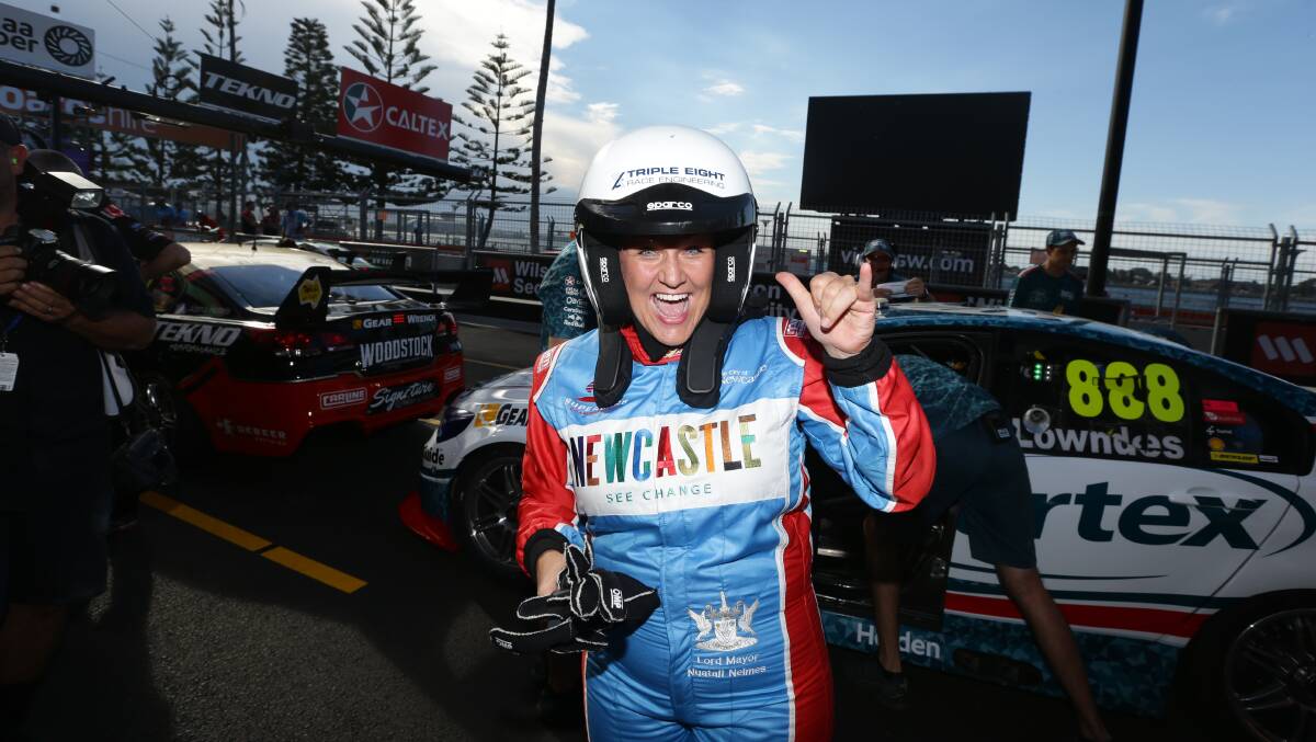 Lord mayor Nuatali Nelmes after completing a lap of the Newcastle circuit with Supercars star Craig Lowndes in 2017. File picture