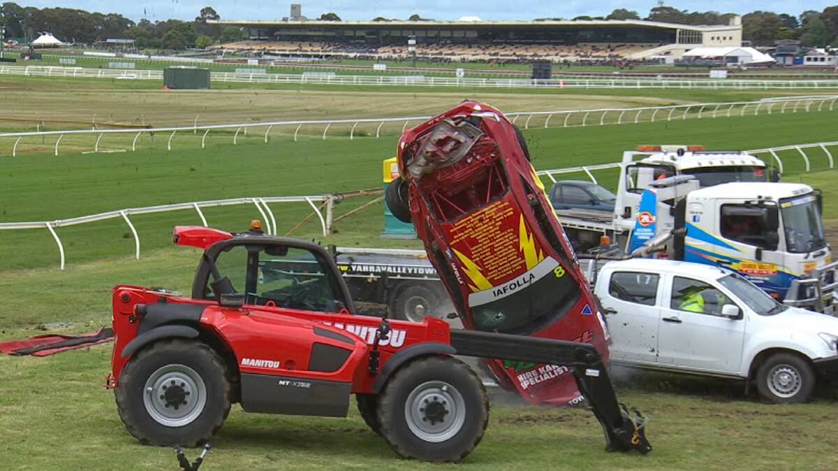 CLOSE CALL: John Iafolla's Toyota misses a tractor, hits a ute and performs a headstand at Sandown.