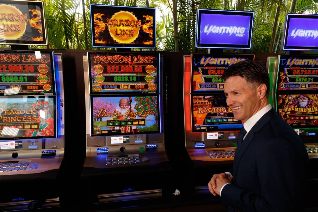 STATE FIRST: Customer Service Minister Victor Dominello announces the cashless gambling trial at Wests New Lambton on Monday. The voluntary trial of a cashless pokie app is scheduled to start in September. Picture: Max Mason-Hubers