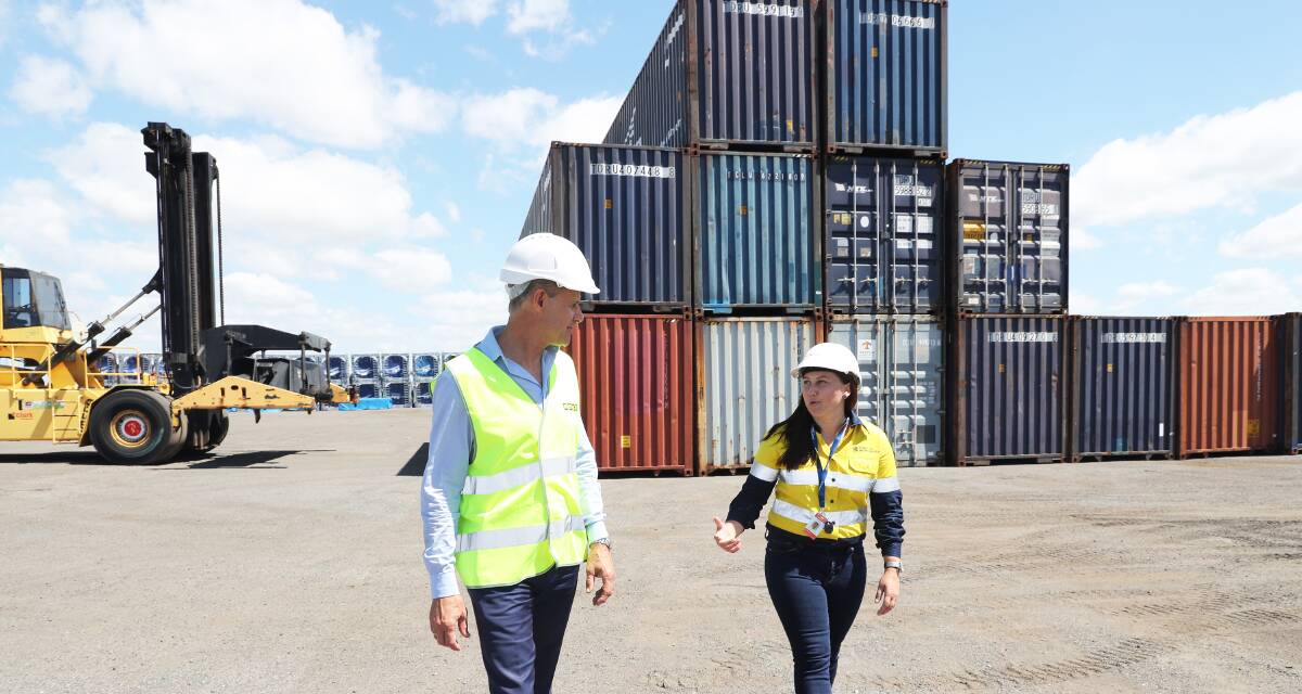 Tim Crakanthorp and Port of Newcastle's senior manager of business development, Kate McArthur, at the port on Monday. Picture by Peter Lorimer
