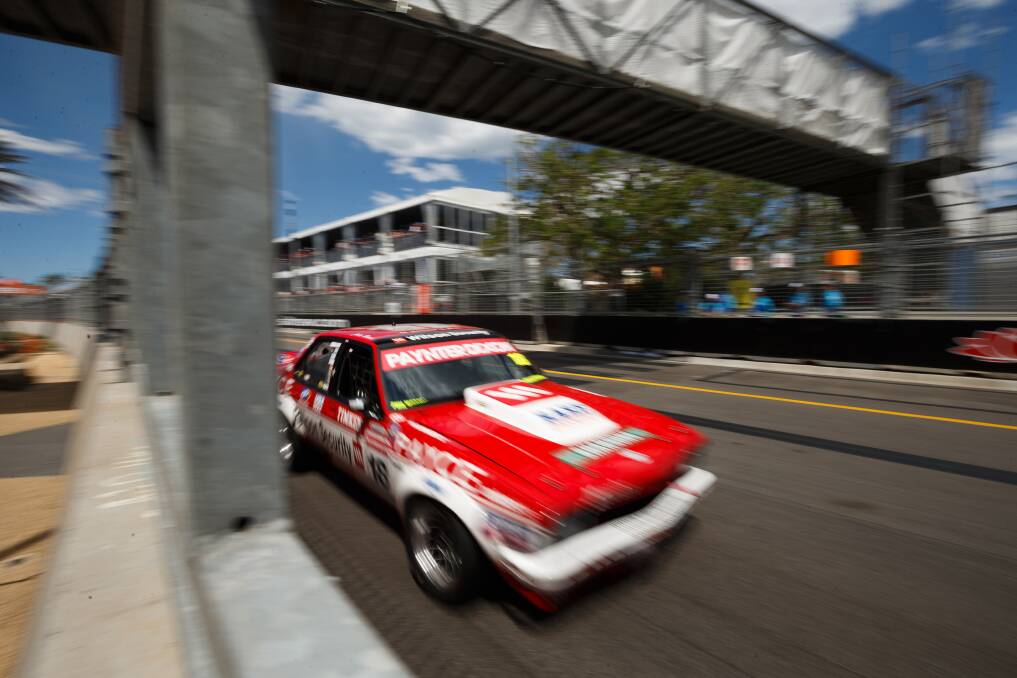 REVVED UP: John Bowe's Torana passes under a bridge during a Touring Car Masters race in Newcastle. Picture: Max Mason-Hubers