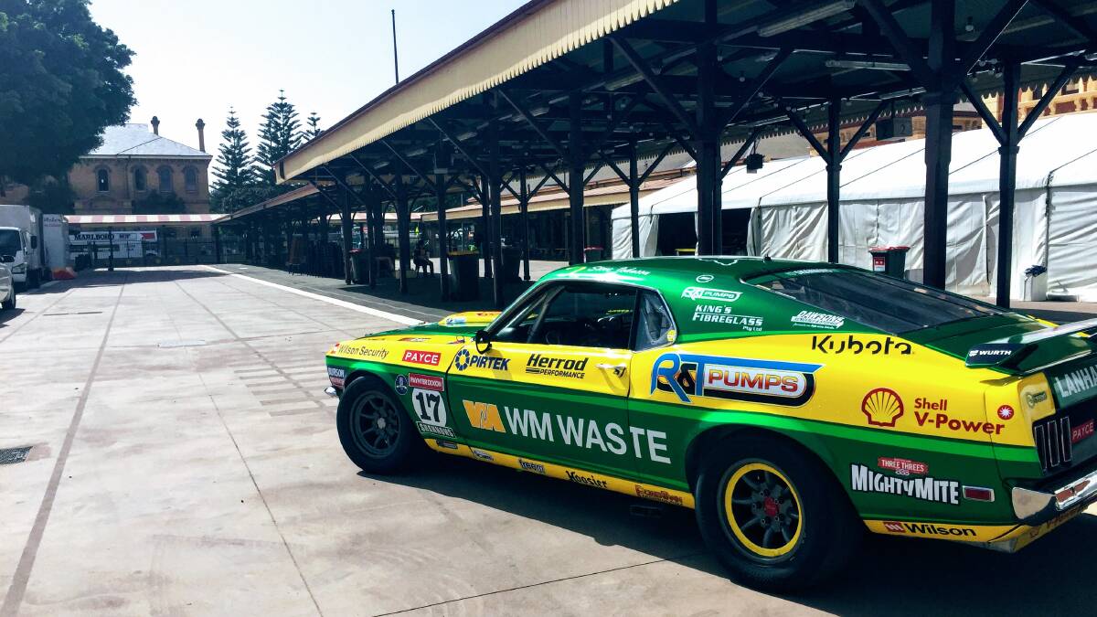 READY TO GO: Steven Johnson's Ford Mustang, the leader of the Touring Car Masters series, parked on the platform at Newcastle Station on Thursday. 