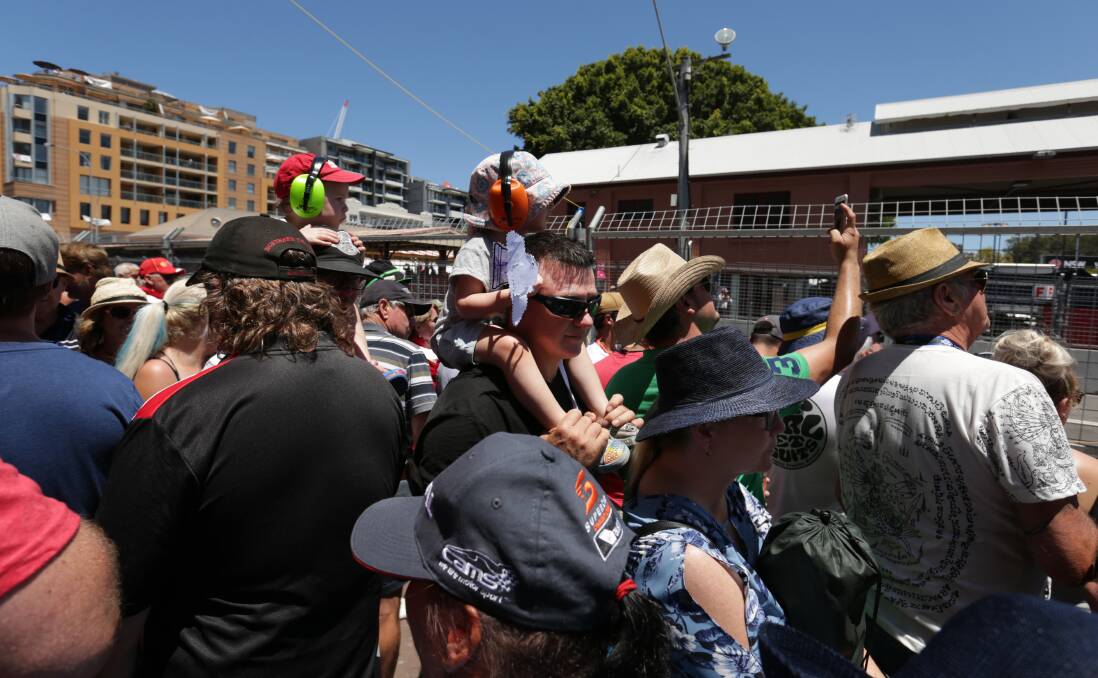 Spectators jostle for a view of the Supercars track in Watt Street last year. 