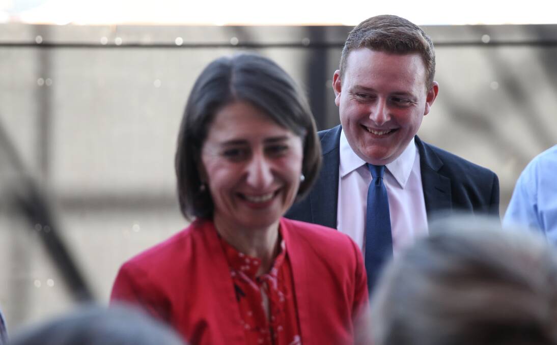 RUNNING: Newcastle candidate Blake Keating with premier Gladys Berejiklian at Friday's light rail launch.