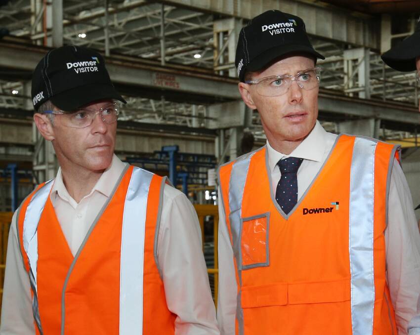 Chris Minns and his Lake Macquarie candidate, Stephen Ryan, at Downer's factory in Cardiff this week. Picture by Simone De Peak